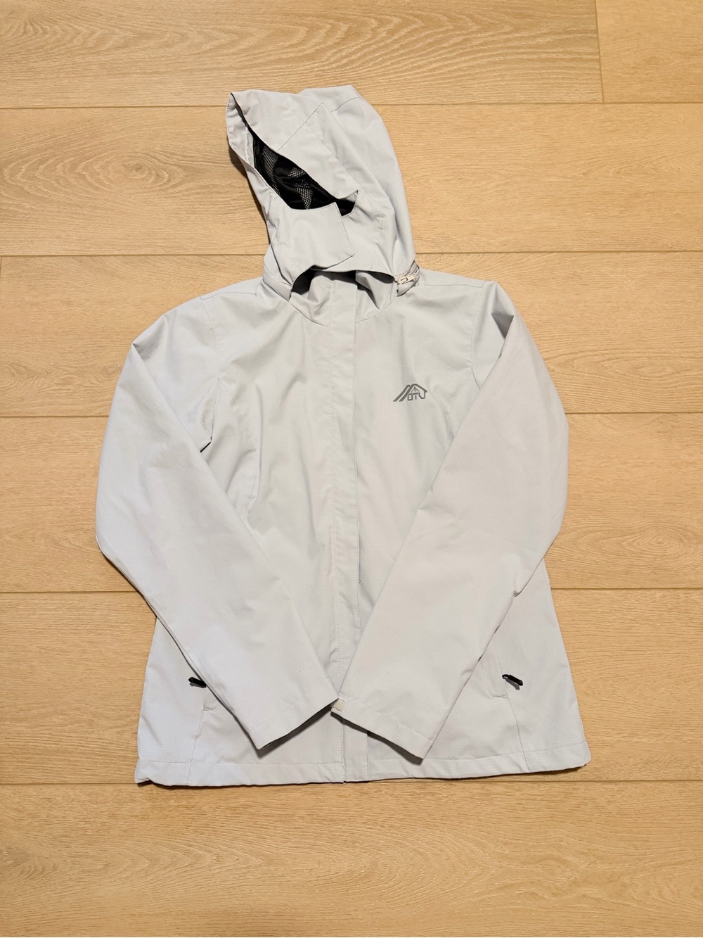 Women's Hooded Ski Jacket in Light Gray with Subtle Logo